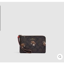 고슴도치 프린트가 있는 시그니처 캔버스의 코치 아울렛 코너 지퍼 팔찌